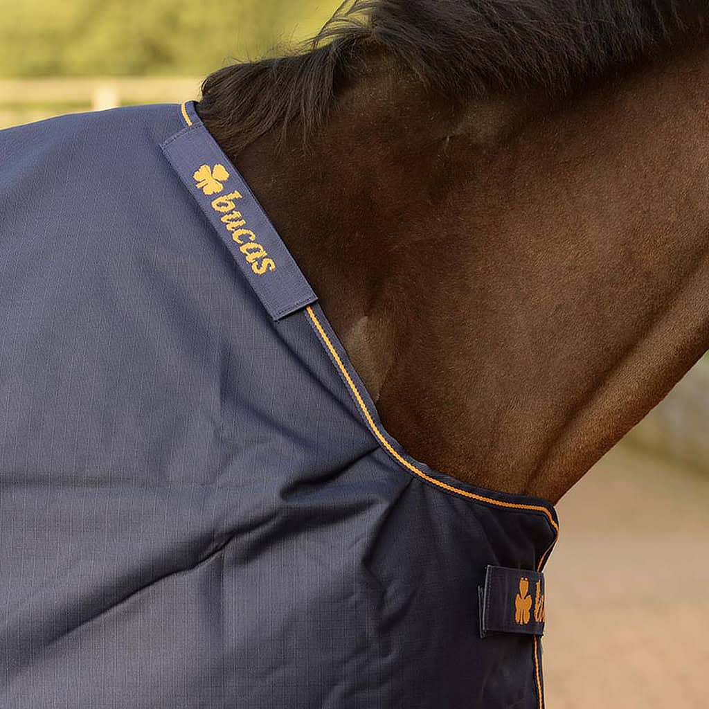 the classic cut neck of the Bucas Irish Turnout rug, with the attachment points for the optional neck cover